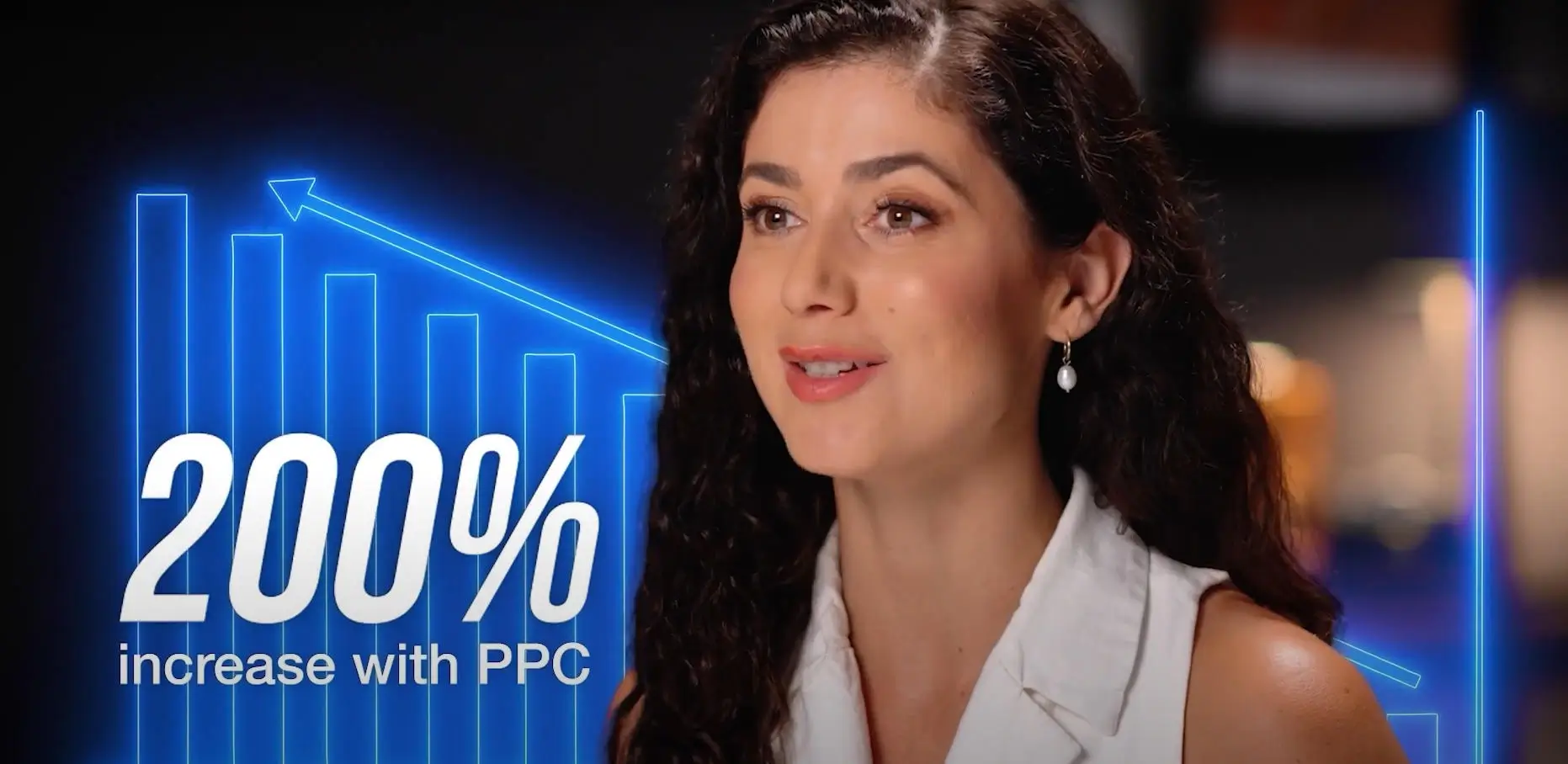 PPC specialist explaining how PPC helps businesses grow, next to a chart showing 200% increase with PPC.